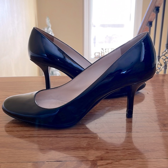 Prada Shoes - Prada round toe patent leather pumps